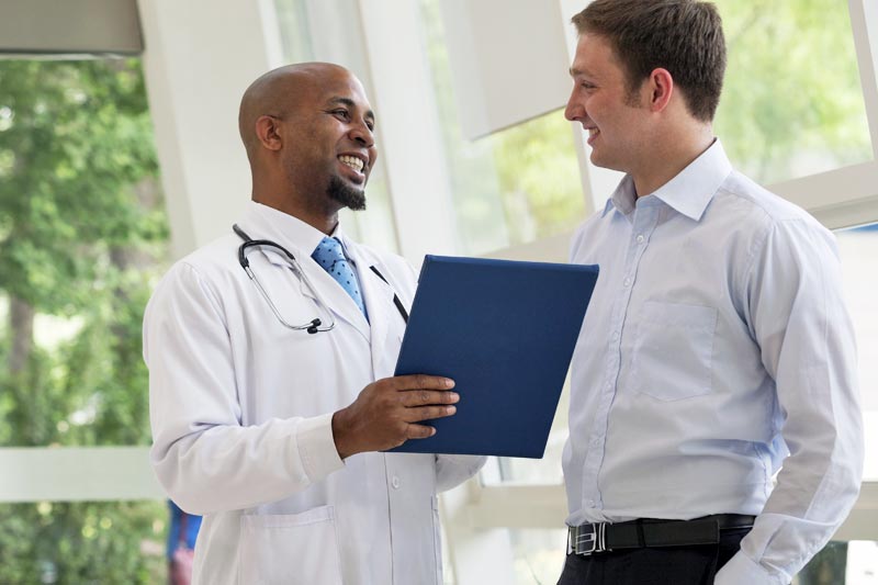 doctor talking to patient