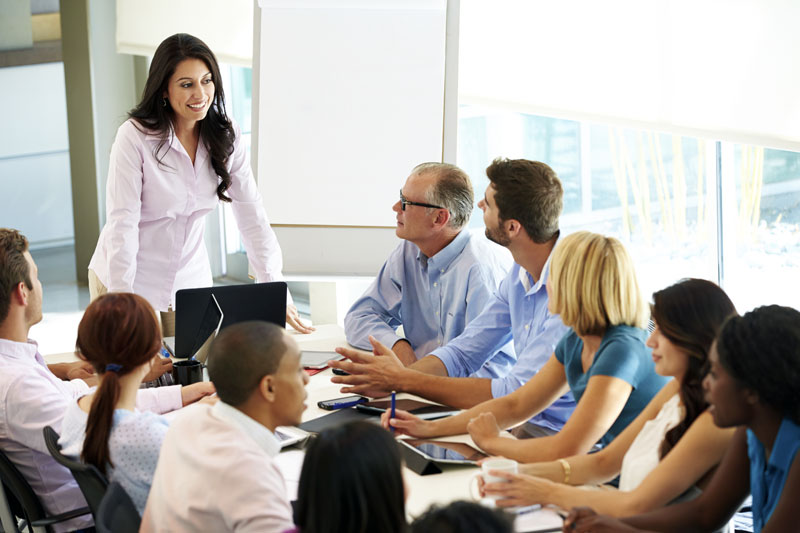 woman conducting a business meeting